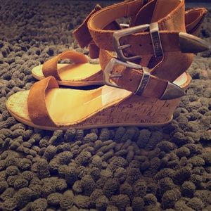 Silver buckle tan suede wedges